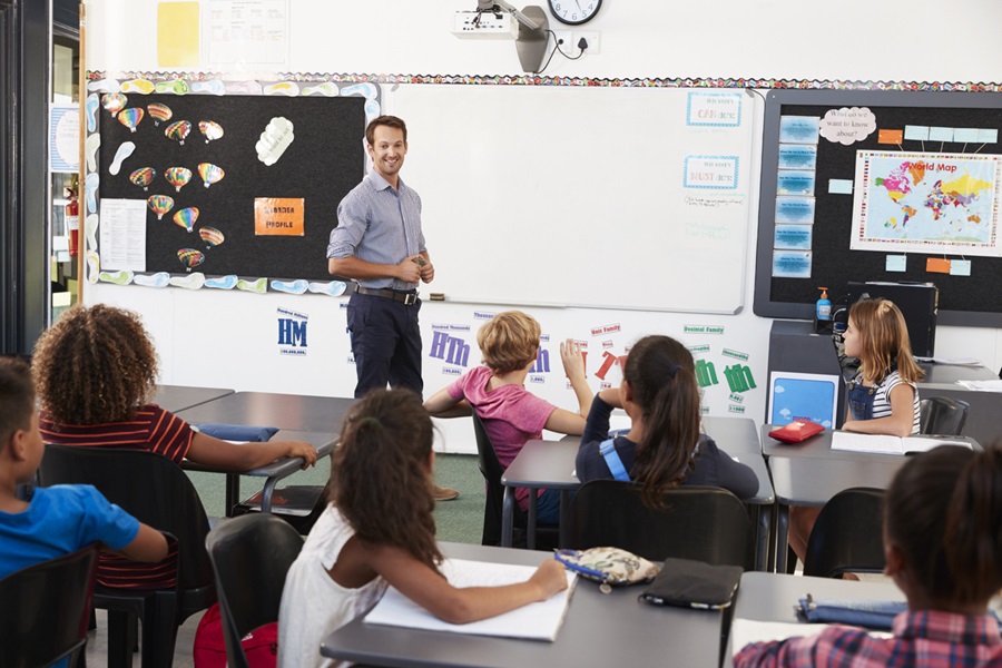 Teacher at front of class in an elementary school lesson