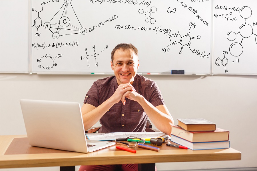 Male teacher smiling