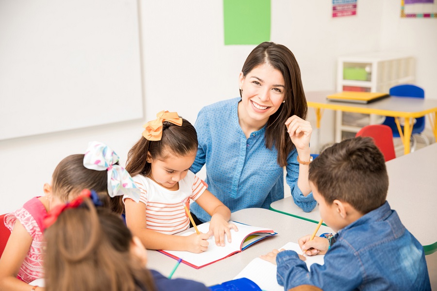 Beautiful school teacher during class