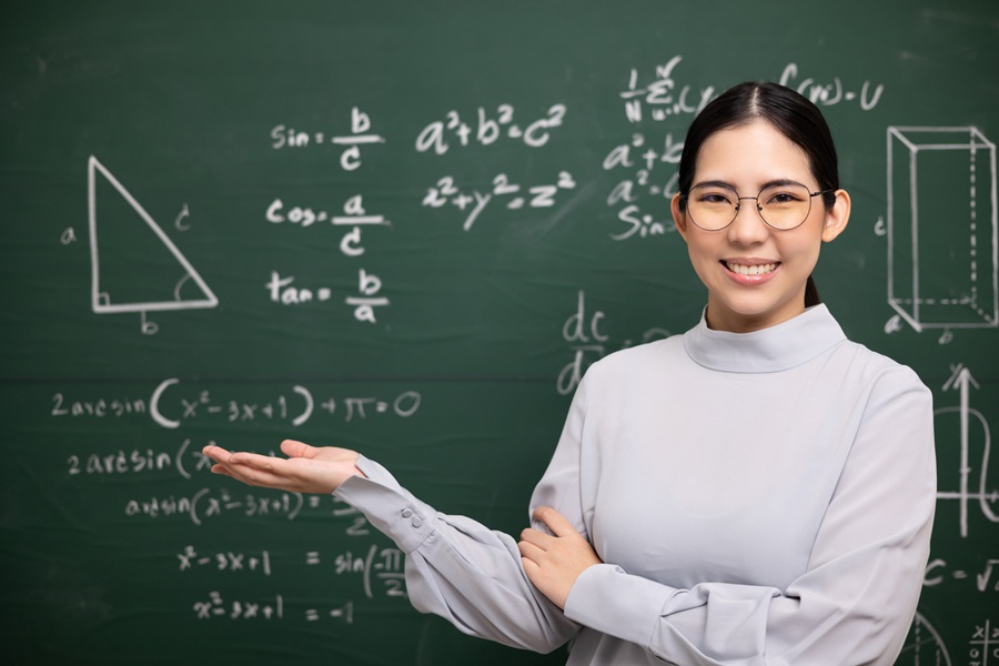 beautiful teacher in the board