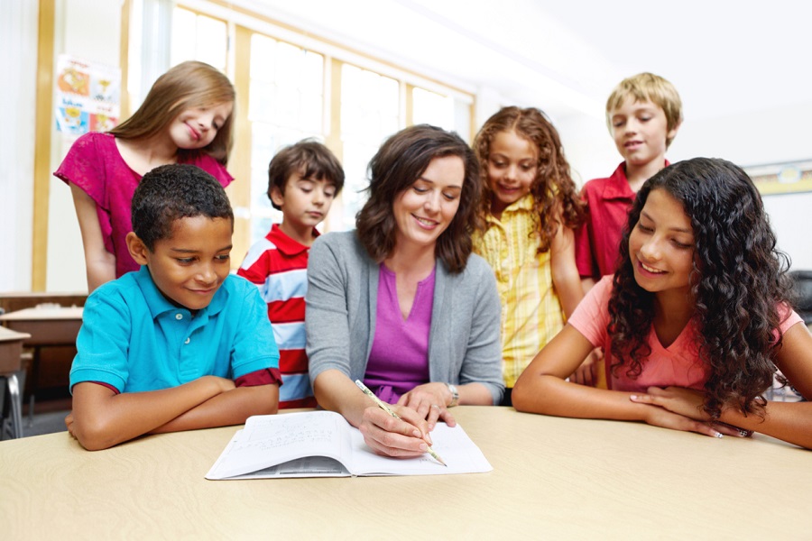 teacher teaching her class